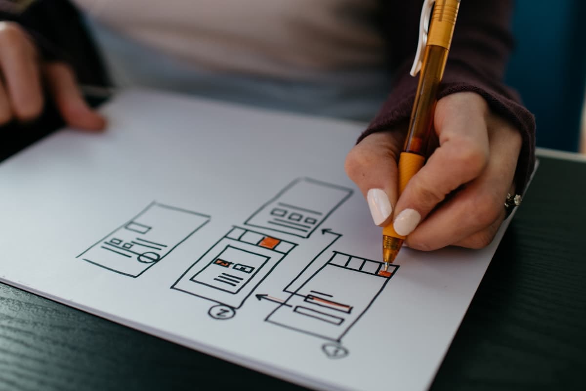 Designer refining layouts on a desk